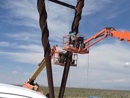 Field welding power poles
